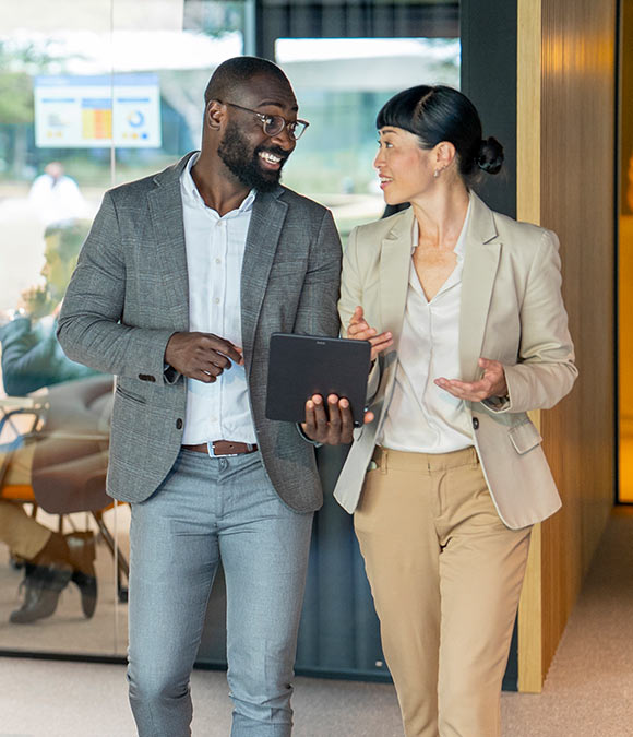 Businessman and Businesswoman are talking